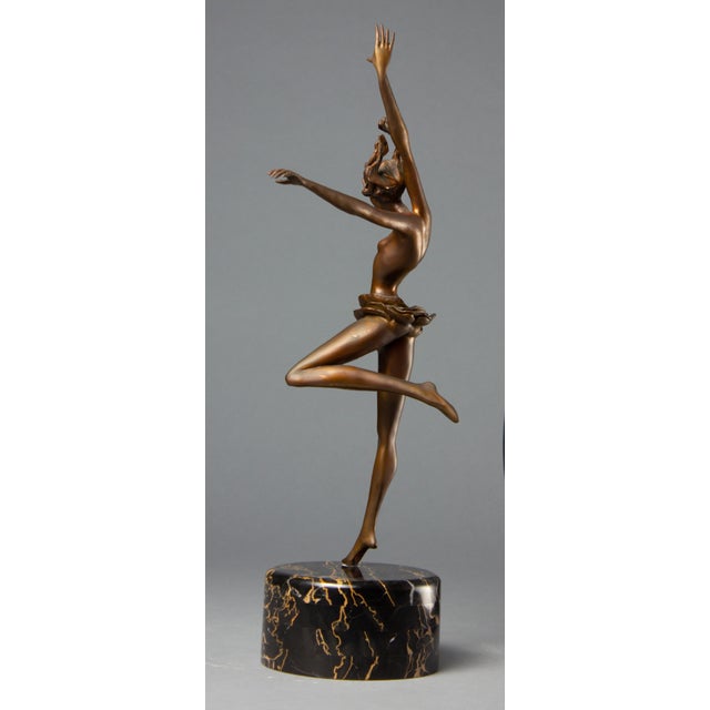 An exquisite sculpture by Irish artist Gabrielle in an Impressionist style, featuring a female dancer in motion. Cast in...