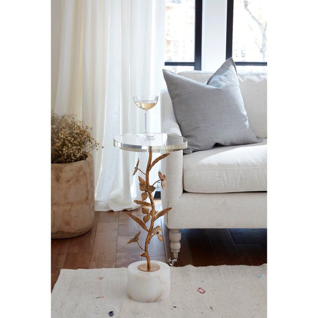 Bring the feel of an upscale lounge to your home, where you can sip and relax with the Trillium Martini / Side Table....