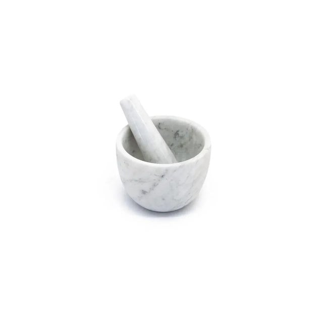 White Carrara marble mortar with pestle. Each piece is in a way unique (every marble block is different in veins and...