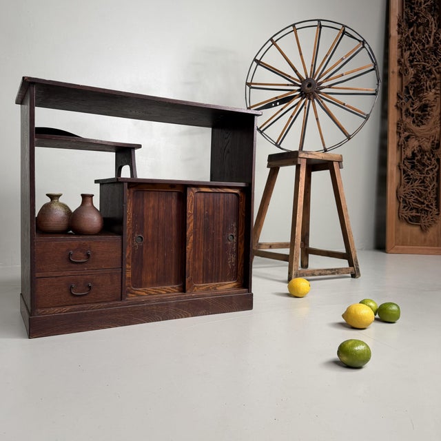 This compact Japanese storage cabinet is a chadansu (tea cabinet), originally used to keep tea ceremony utensils neatly...