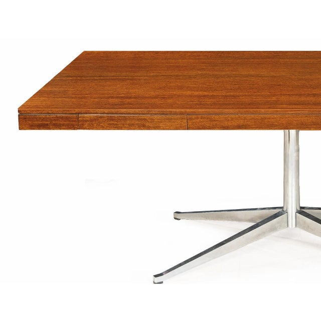 Florece Knoll " Executive Partner" model table circa 1960-1965 in mahogany with two drawers and steel base This piece is...