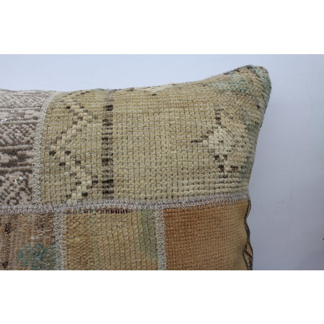 This Turkish pillow cover is made from the highest quality vintage rugs in 100% wool on the front. The back is covered in...