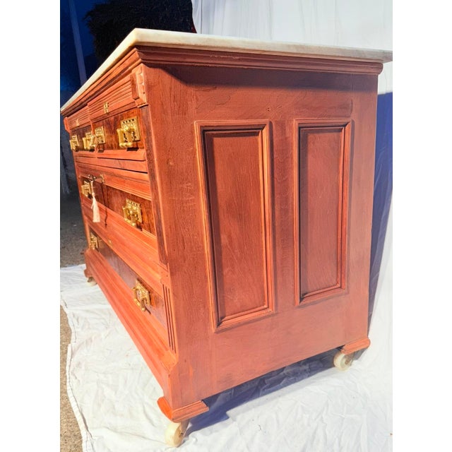 A beautifully restored antique Eastlake chest of drawers dating to approximately 1870–1890. Crafted from walnut with...