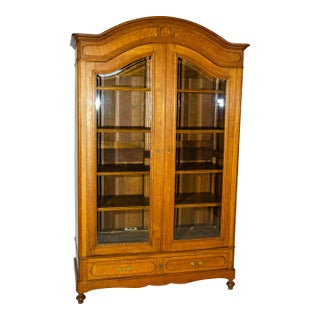 Early 20th Century Oak Media Cabinet with Beveled Glass Doors For Sale