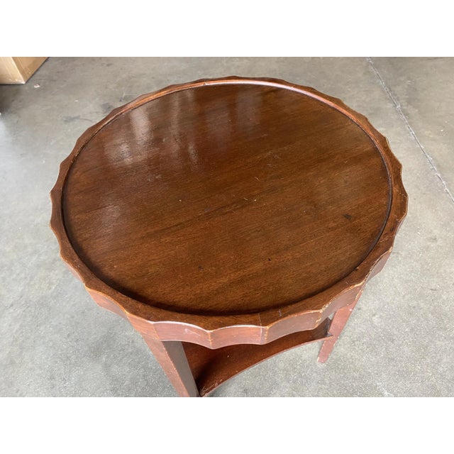 Beautiful streamline coffee table, circa 1930. The Classic Art Deco side table with bottle cap shaped top and second tier...