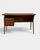 Elegant freestanding teak desk designed by Gunnar Nielsen for the Danish manufacturer Tibergaard. A classic example of...