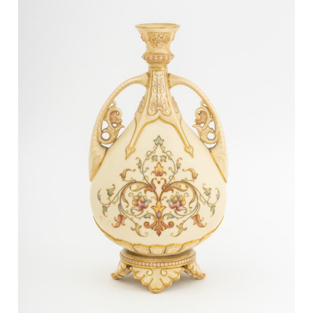 Two Art Nouveau Ceramic Vessels, comprising: Royal Worcester vase with gilt trim and floral motif, marked to underside and...