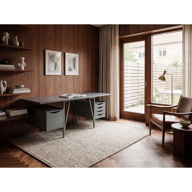 An exceptional large-format desk designed by Castiglioni. Crafted in a gray finish—now discontinued and difficult to...