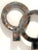 This large scale Mid-Century Modern mixed metal wall sculpture was created in the style of a piece ("Neutrality") designed...