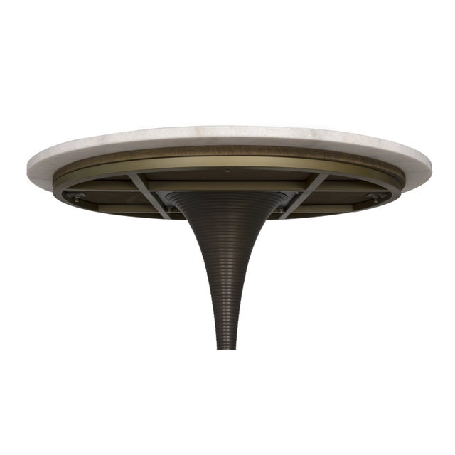 The Joni Bar Table boasts a spacious 36 x 36-inch surface, providing ample room for drinks, appetizers, or casual...