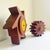 A large-scale, sculptural pair of antique industrial wooden foundry gears sourced from Angels Camp, a gold rush town in...