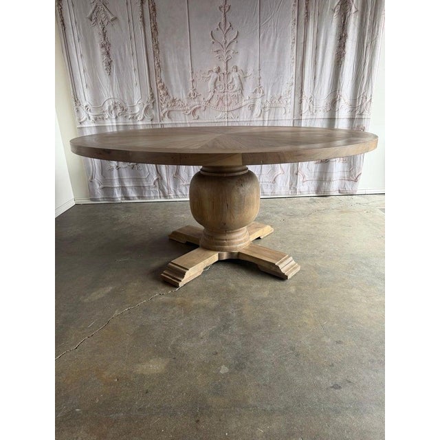 Designed by Melissa Levinson for Miamar Home, this sculptural round dining table is a masterclass in modern organic...