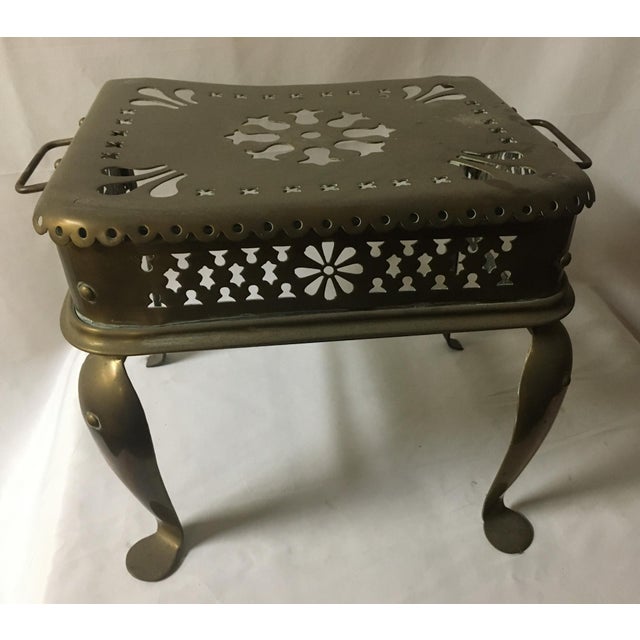 Retaining the original old brass patina, this early 19th century item had different purposes. It could be used as a sturdy...