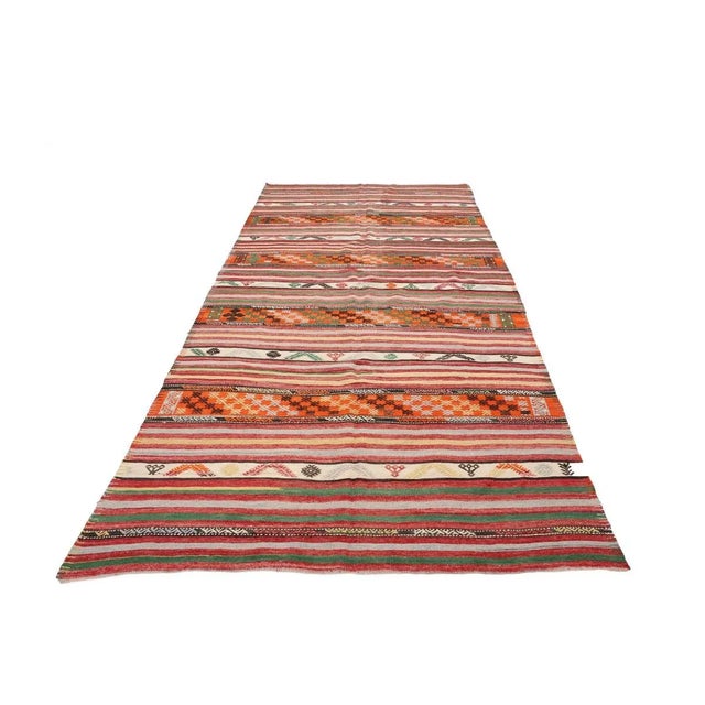 Vintage handwoven decorative kilim rug from Denizli region of Turkey. Approximately 50-60 years old. In very good condition.