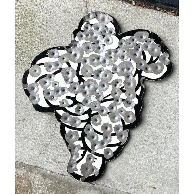 This singular piece of contemporary Pop Art masterfully blends cinematic nostalgia with a gritty, industrial aesthetic....