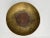 A single round hammered brass offering or incense bowl with Greek key style decoration on interior. .