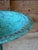 An elegant vintage cast iron garden tazza featuring a beautifully weathered verdigris finish and an ornate scrolling...