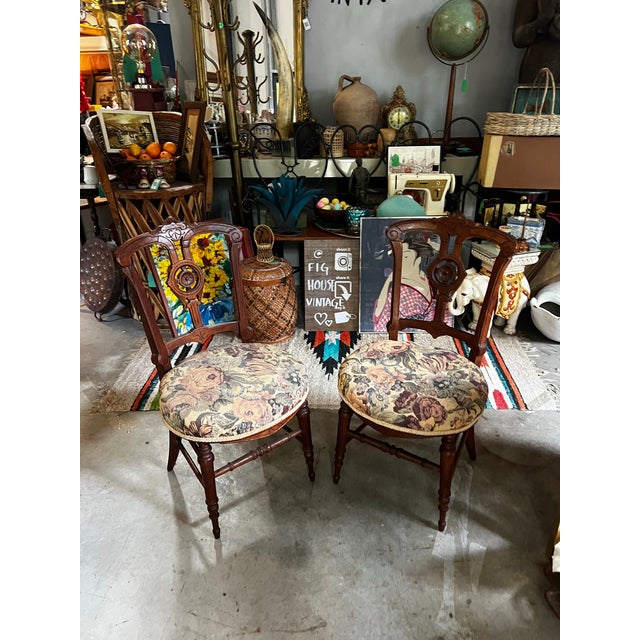 Up for consideration is a beautiful vintage pair of wooden carved accent chairs with central medallion details. These...