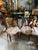 Up for consideration is a beautiful vintage pair of wooden carved accent chairs with central medallion details. These...
