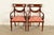 A gorgeous pair of Italian Provincial or English Regency style armchairs or dining captain chairs In the manner of Baker...