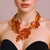 Oscar de la Renta 22k gold plated orange amber resin leaf statement necklace with adjustable extender chain. Luxury...