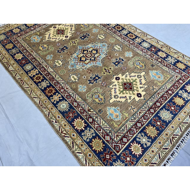 2000 - 2009 Brown and Navy Kazak Style Tribal Area Rug With Medallions, 5' X 7'7" For Sale - Image 5 of 15