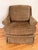 This cozy early 21st century brown chenille armchair is custom-upholstered in a small diamond lattice pattern. It features...