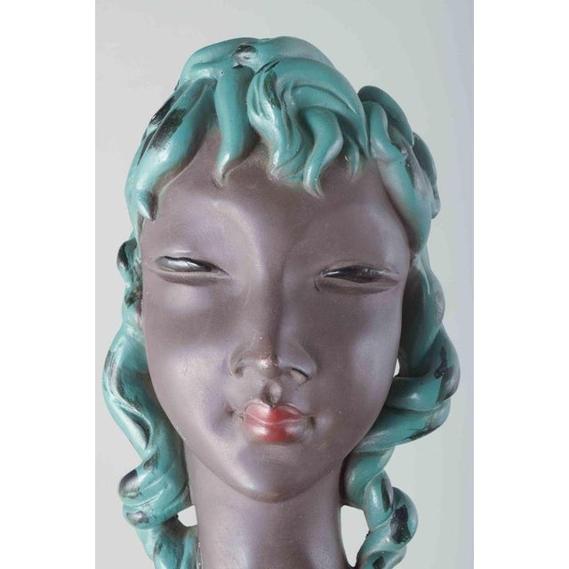 Gino Manca Ceramic bust, mid-20th century. Decorative Italian ceramic bust of a woman’s head with turquoise and black hair...