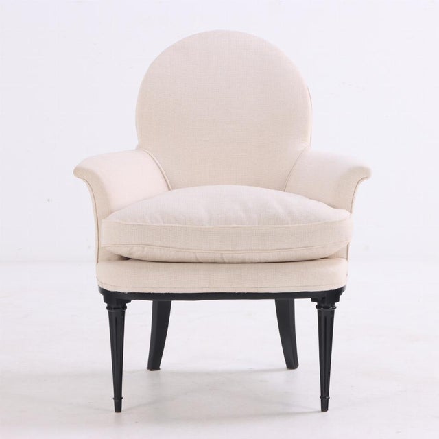 Found in Argentina, this elegant pair strikes a lovely silhouette with rounded backs, outward scrolling arms, and ebonized...