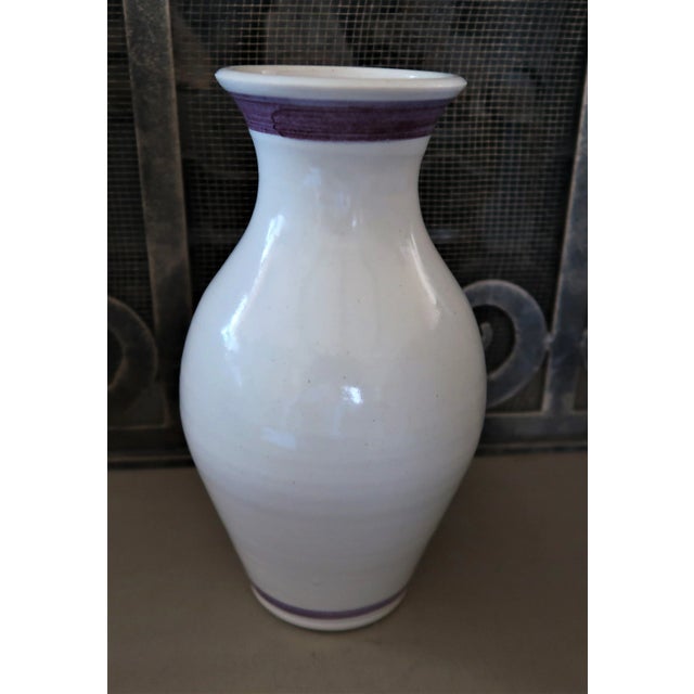 Stunning piece of Japanese inspired studio pottery vase. Iris flowers are in plums and mauve. The leaves are in variegated...