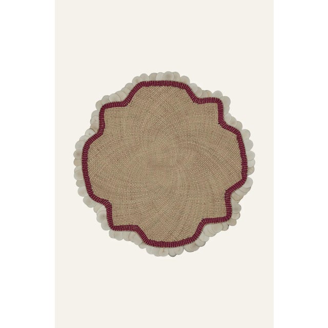 Johanna Ortiz's "Casa Collection '24" features exquisite placemats crafted by women artisans from Sandoná, Colombia, using...