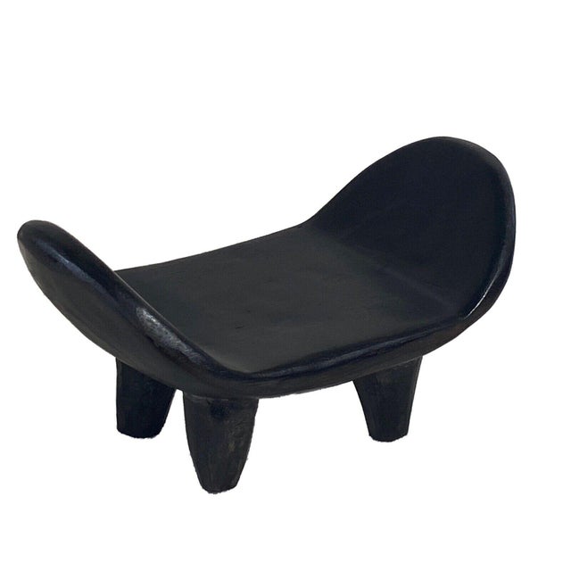 Superb Solid hand carved of one piece of solid wood milk stool /head rest by the Senufo Cote D'ivoire w/ solid legs....