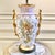 Antique porcelain vase lamp with two gold-leaf branch “arms”. Delicate floral design. Pale pink, pale blue and green, with...