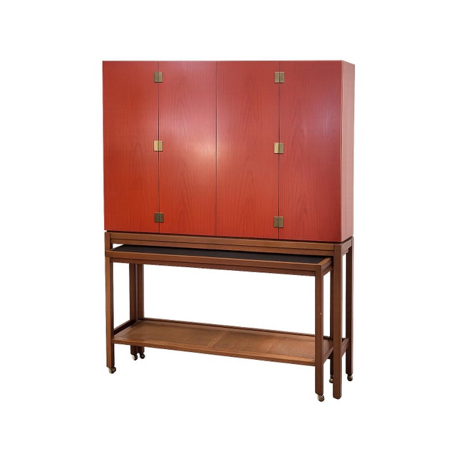 A striking and highly functional Mid-Century Modern bar cabinet dating to July 1966, as documented by the original...
