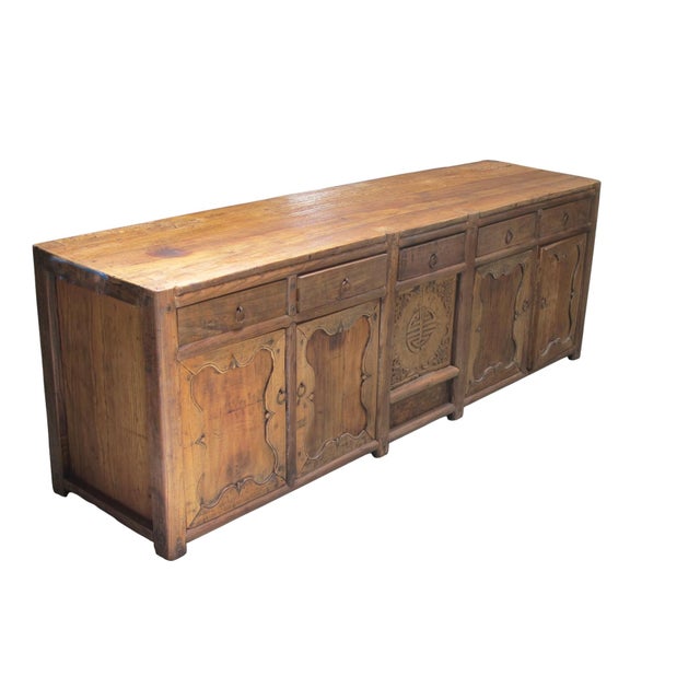 This late 17th century sideboard was handmade from sturdy, seasoned elm and features a warm, natural honey finish with a...