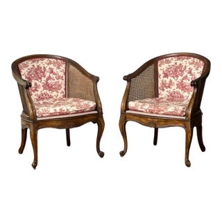 Pair French Louis XV Style Walnut and Cane Barrel Back Bergere Chairs in Toile, 20th C. For Sale