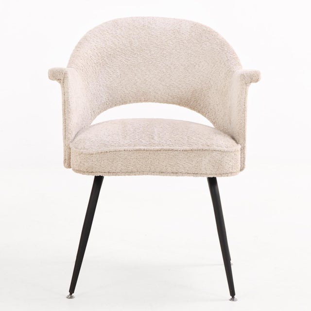 A stylish pair of Mid-Century lounge chairs in the manner of Jules Leleu, inspired by the refined elegance of French mid-...