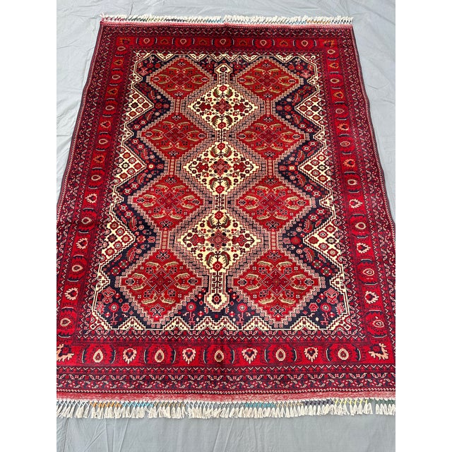 A finely hand-knotted Afghan Khal Mohammadi rug woven in premium Biljik (Belgian) wool — lightweight, soft, and silk-shiny...