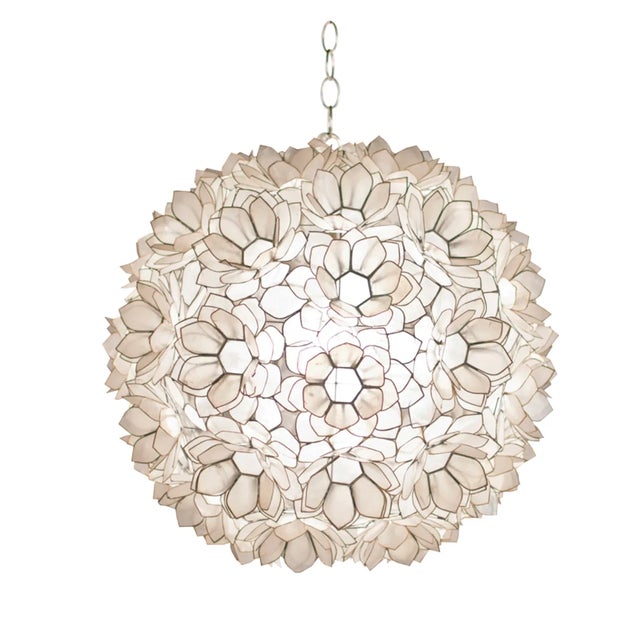 A brilliant fusion of light and art, the Jupiter pendant is an absolute showstopper. Lotus flower motif features literally...