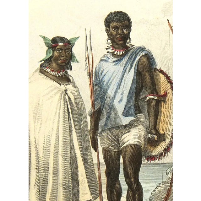 Beautifully hand colored engraving of a trio of Mozambique natives by Dr. Rouargue, circa 1850. Displayed on a white mat...