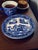 The Vintage Japanese Willow Divided Blue & White Plate is a charming and collectible piece showcasing traditional Japanese...