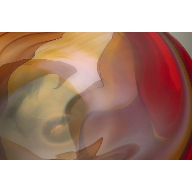 Large Signed Studio Art Glass Centerpiece Bowl – Red, Gold & Amber – 23” W About the Maker The artist responsible for this...