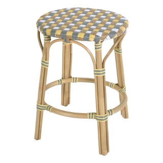 Ballito 24.5 in. Seat Height Oval Rattan Counter Stool with Footrest, French Yellow, Brown, Gray & White For Sale