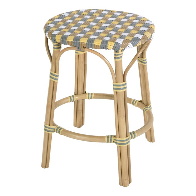 Ballito 24.5 in. Seat Height Oval Rattan Counter Stool with Footrest, French Yellow, Brown, Gray & White For Sale