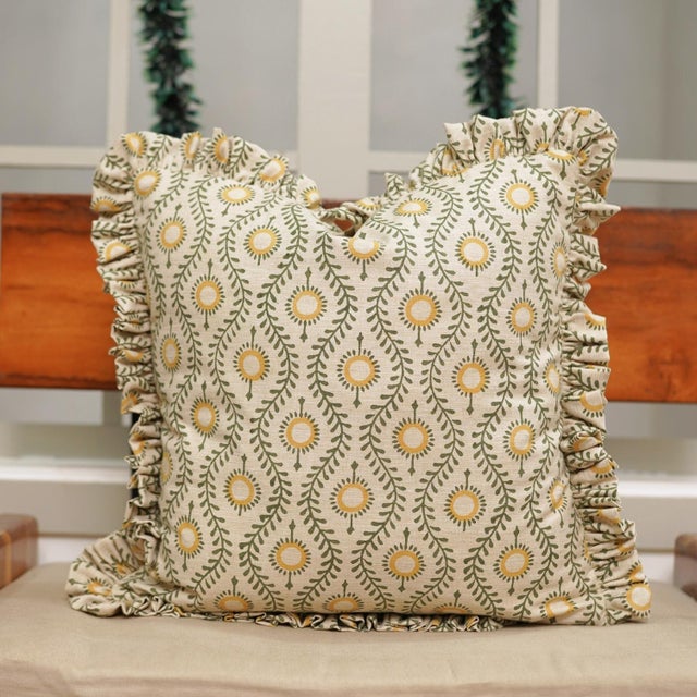 Add a touch of artisanal elegance to your space with this Boho Floral Block Print Frill Pillow Cover, beautifully handmade...