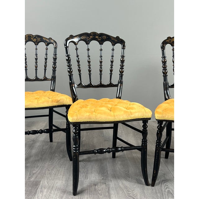 Set of four Napoleon III chairs in ebonized wood An elegant set of four Napoleon III period chairs in ebonized wood,...