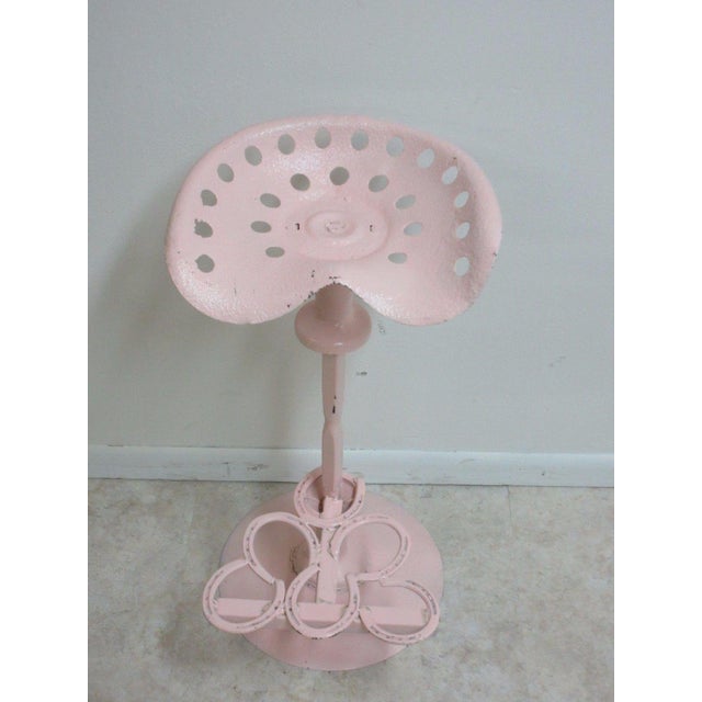 An antique tractor seat bar stool. ( l x w x h) 16 x 20 x 34" seat height 30" great shape, shows age related wear. Made...