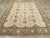 An antique Turkish Oushak room size carpet. This western Turkish town piece has a spacious, genuine allover pattern repeat...