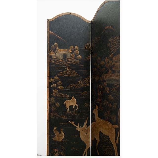 Vintage 4 panel folding screen with playful deer figures. Trimmed around the edges with nailhead trim. Each panel 18.5" x 79"