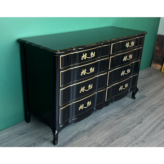 This is a solid built French provincial dresser of nine drawers This dresser is newly refinished in high gloss black...